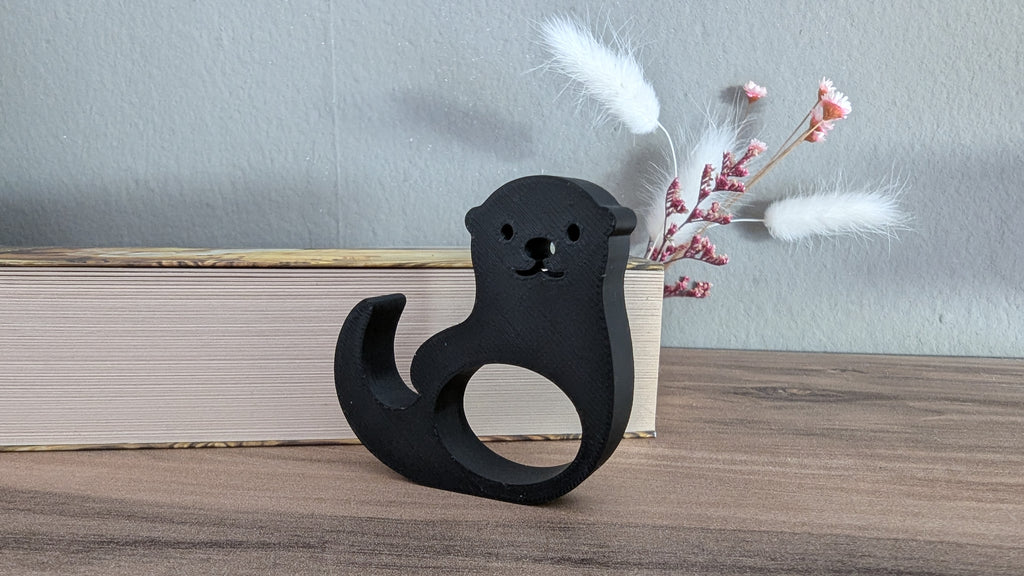 Seitenhalter / Daumen-Lesehilfe Otter